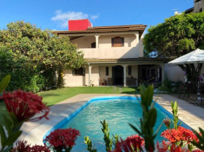 Bela casa de praia, arborizada, um paraíso!